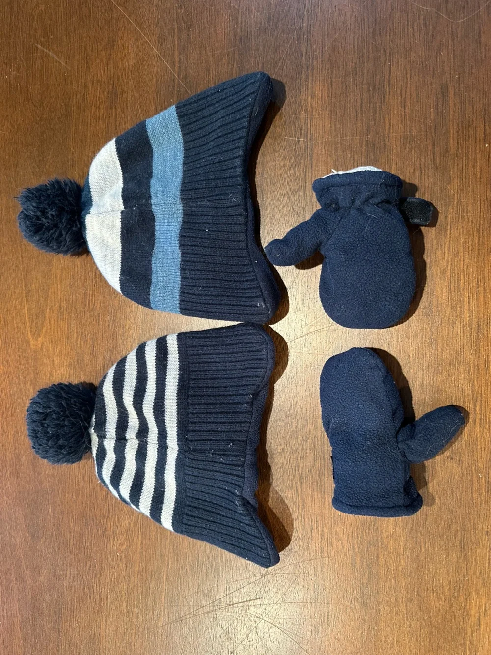 boys winter hats (2) and one pair of mittens toddler size